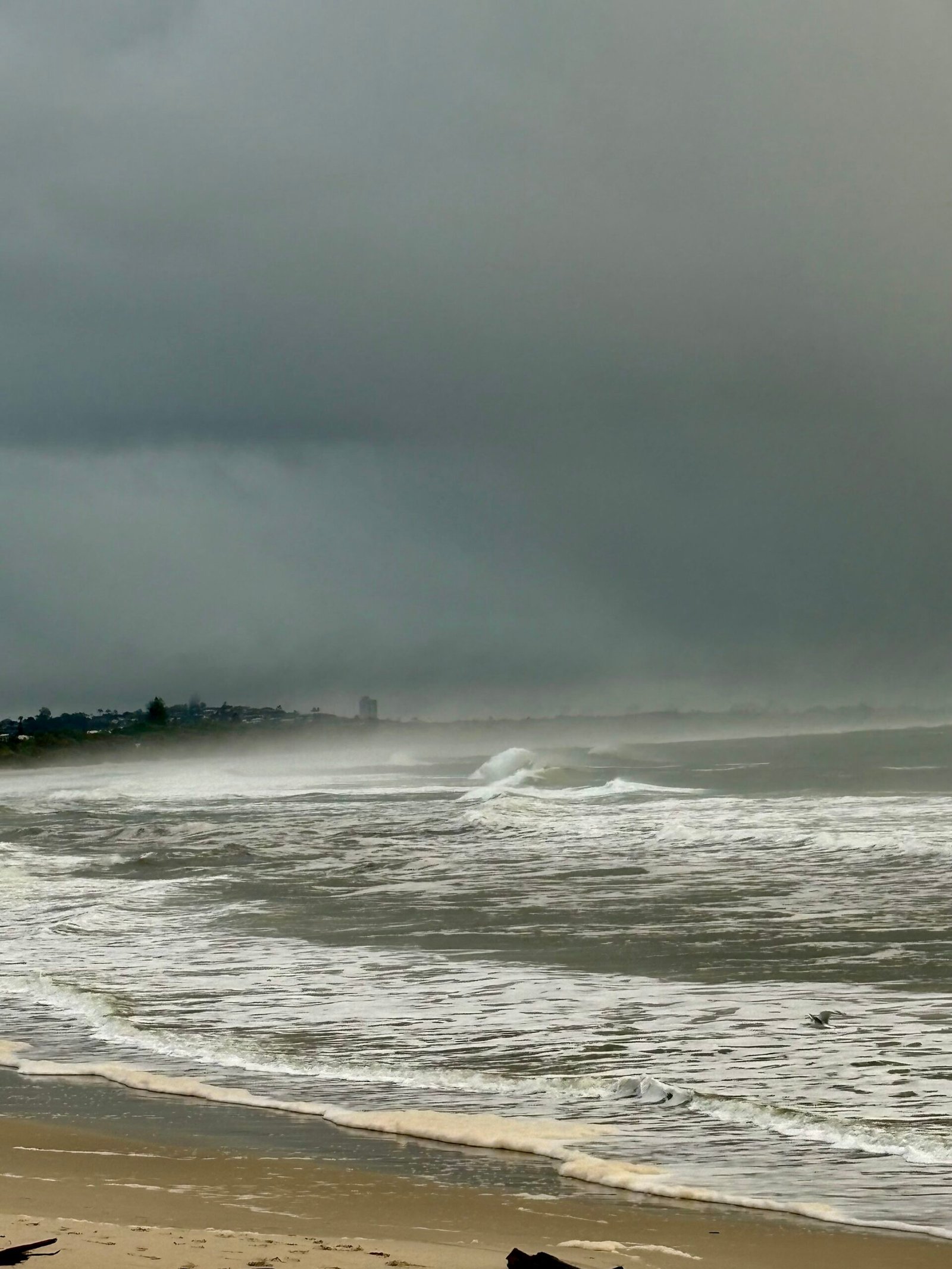 Stormy ocean waves illustrating the experience of chronic stress and burnout.